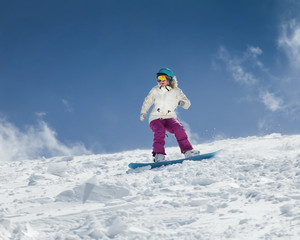 Snowboarder moving down