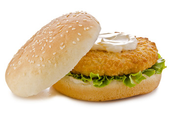 Crispy chicken burger with a breaded patty, fresh lettuce, and creamy mayonnaise, served on a sesame seed bun. Presented on a white background, perfect for food advertisements and menu designs