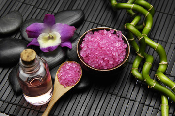 Spa and wellness- salt on spoon, orchid, candle