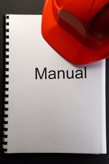 Manual with red helmet
