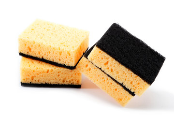 Stack of cleaning sponges on a white background.