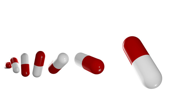 G&eacute;lules align&eacute;es sur fond blanc