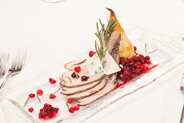 Grilled meat with cranberry sauce