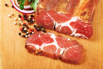 Obraz premium Spicy pork loin stick and slice