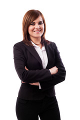 Beautiful businesswoman standing with crossed arms