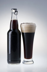 Bottle  and glass of dark beer