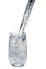 Water stream being poured into a glass