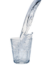 Water stream being poured into a glass