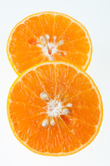 slices of orange on white background