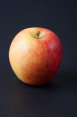 red apple isolated on black background