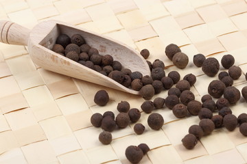 Allspice berries on a table mat