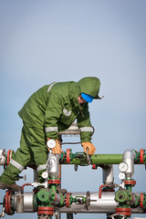 The worker of the oil and gas refinery