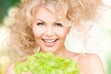 happy woman with lettuce