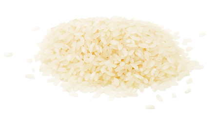 Uncooked heap of rice on white background