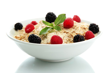 tasty oatmeal with berries, isolated on white