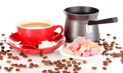 Red cup of coffee with rahat delight (locum) and coffee pot