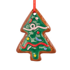Green christmas tree toy on white background