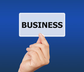 man hand holding button business keyword