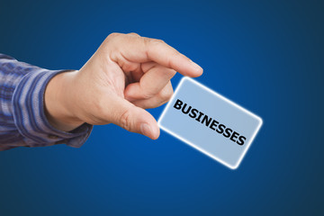 man hand touching button businesses keyword