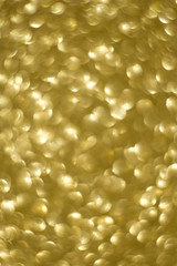Blurred gold sparkles