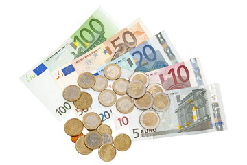 Euro banknotes and coins isolated on white background
