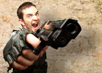 Angry Soldier Holding Gun