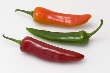 Three colourful peppers