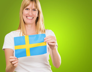 Happy Woman Holding Swedish Flag