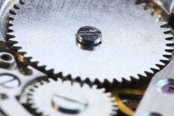 Extreme close up shot of two mating watch gears