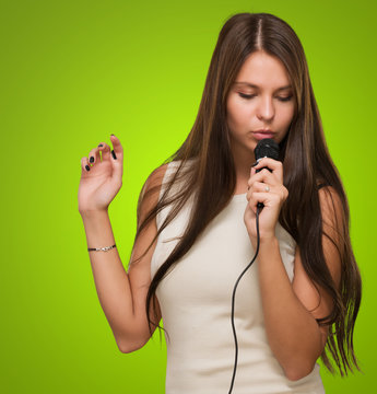 Young Woman Holding Microphone