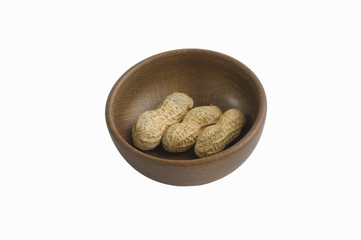 Peanut in wooden bowl