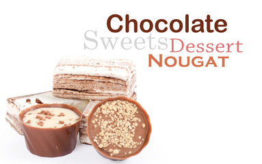 Chocolate and nuts over white