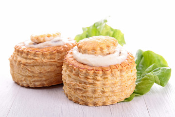 Obraz premium puff pastry with cream and salad