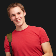 Portrait Of A Student Holding A Backpack