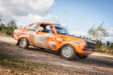 Zelfklevend Fotobehang speeding rally car motion blur © Steve Mann