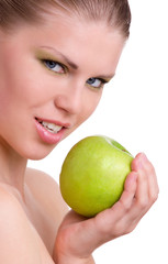 Beautiful Woman With Green Apple Looking Towards Camera