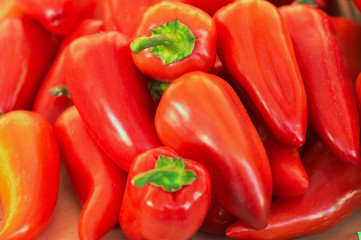 many fresh red ripe sweet pepper