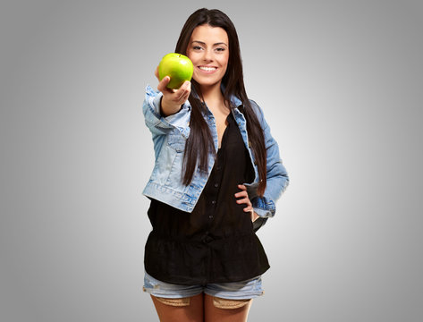 Woman Showing Green Apple