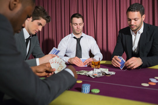 Men Playing High Stakes Poker Game