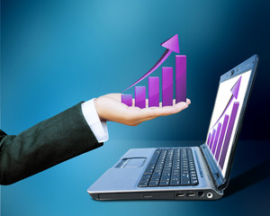 Hand of women business graph on computer background