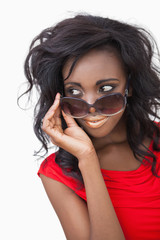 Woman wearing sunglasses while looking