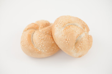 Sesame buns leaning on each other