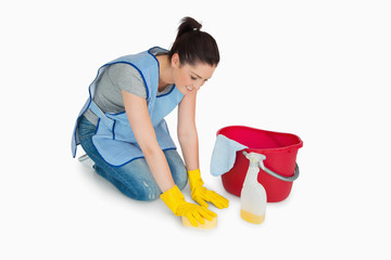 Cleaning woman washing the floor