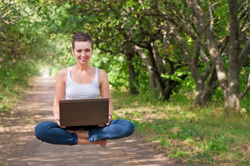 girl and laptop outdoors