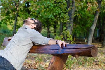 Man relaxing on bench