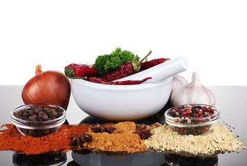 Composition of White mortar and pestle with spice and