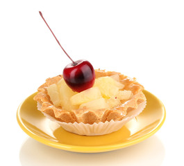 sweet cake with fruits on saucer isolated on white