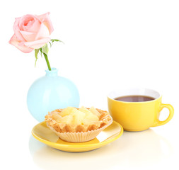 sweet cake with cup of tea isolated on white