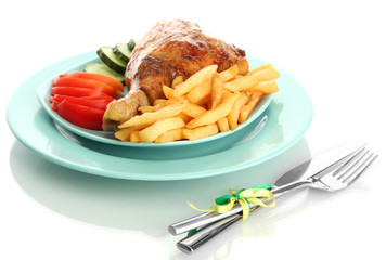 Roast chicken with french fries and vegetables