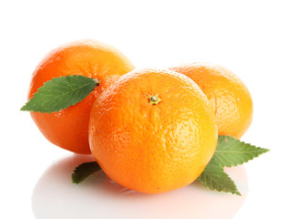 ripe tangerines with leaves isolated on white